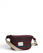 Pink, magenta and teal striped jacquard fanny pack with beige webbing strap