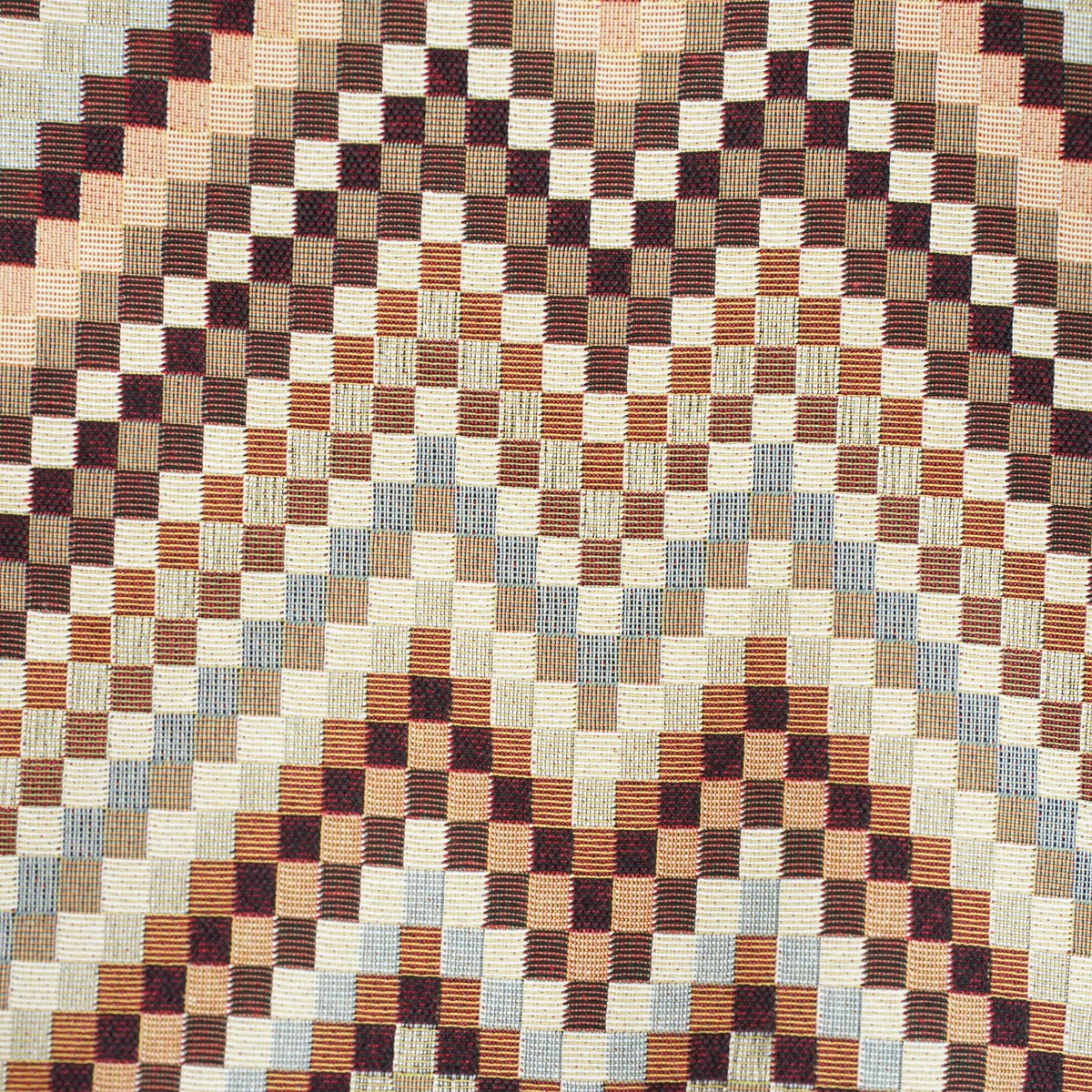 Close-up of the woven jacquard pattern on the brown and beige zigzag jacquard small pouch and coin purse