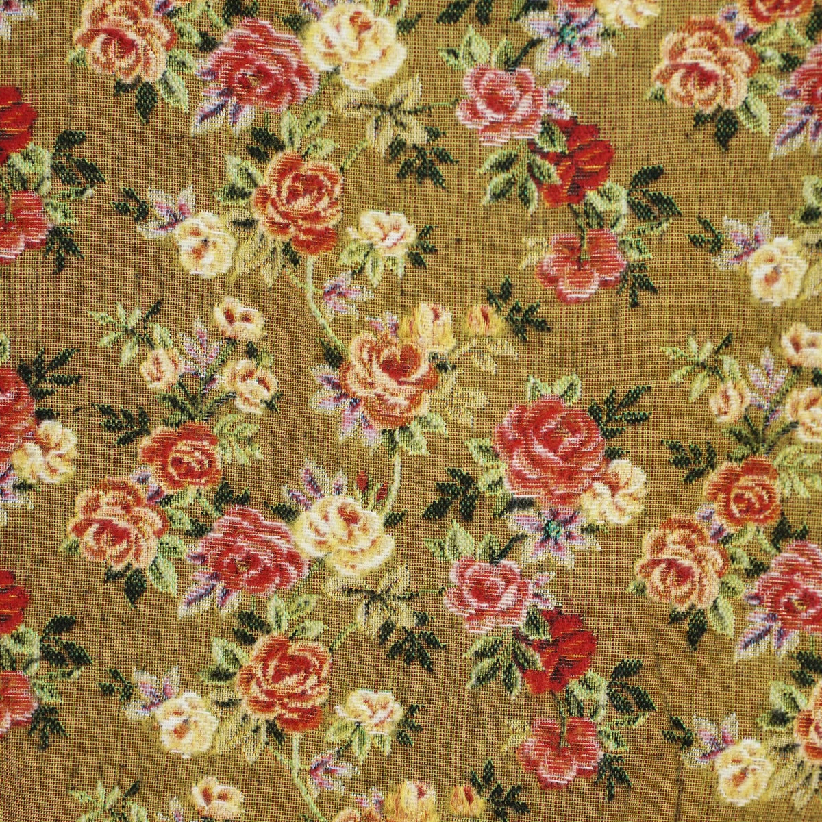 Close-up of the woven jacquard pattern on the mustard and red floral jacquard small makeup bag